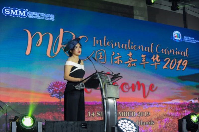 Dr. Goh Hui Chyn giving a speech at the MRC International Carnival
